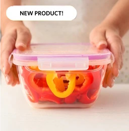 person closing a plastic container of sliced peppers