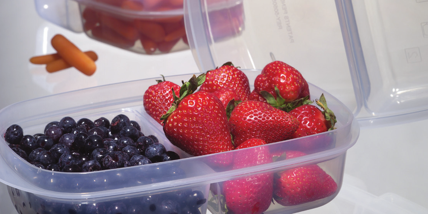 clear polypropylene container of strawberries and blueberries, made clear with the millad nx 8000 PP clarifier