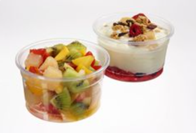 Two clear containers with fruit and yogurt inside